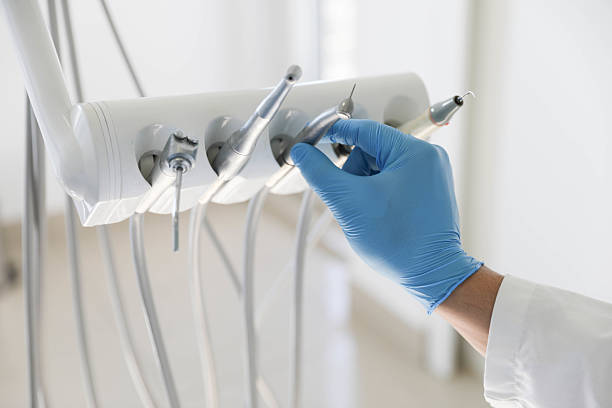 Professional Emergency Dentist technician working in Essexville, MI